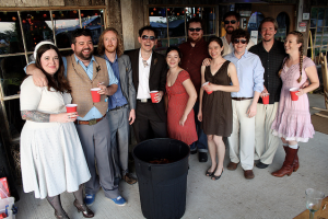 Lee Collyer ’03 had a fine assemblage of alumni at his wedding (we won’t ask why they assembled around a trash barrel): (left to right) Kelly Collyer, Lee Collyer, Michael Harrington ‘03, John Fedorowicz ‘03, Carrie Sterr ‘02, Richard Platzman ’05, Erin Barnard ‘03, Ben Coello, James (Brad) Heck ‘04, Toby Conroy ‘02, Chloe Conroy.