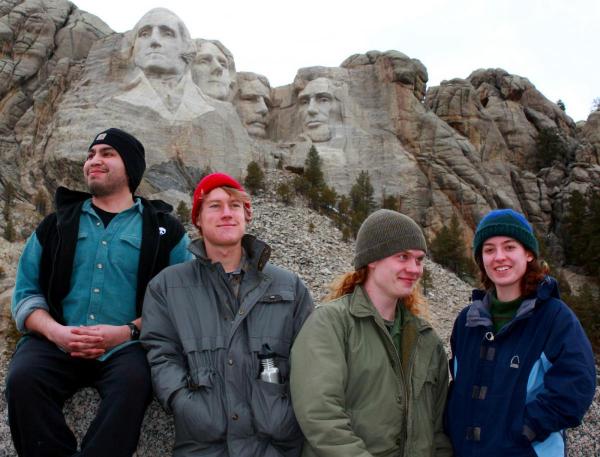 James Munoz ’14, Ryan Hitchcock ’12, Aaron Evan-Browning ’12 and Jacquelynn Ward ’12 strike a pose with some other memorable characters during their Spring Break trip to Yellowstone National Park. Photo by Travis Trumbly