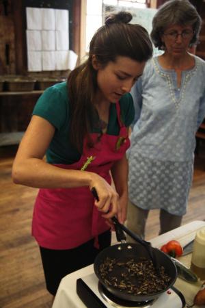 In September, Daniella Martin ’02 visited the dining hall to give a talk and demo on the finer points of preparing and eating insects, also known as entomophagy (see Potash Hill, Winter 2011). She’s seen here stir-frying crickets with anthropology professor Carol Hendrickson.  