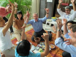 Kevin and his staff at Peace Corps Thailand celebrate during a som tam (papaya salad) making contest.