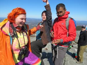Marty Piper ’19 and John Marinelli '17 ham it up on Mount Monadnock with Dhruv Jagasia, a student in Marlboro’s MBA program and CEO of the social enterprise Dharma Eyewear. Photos by Jodi Clark