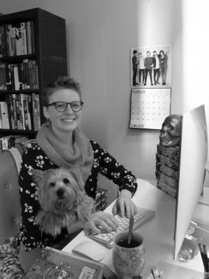 Molly Booth and her dog Suzie get down to business in her Portland apartment. Photo by Mike Rogers
