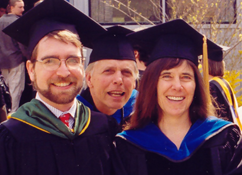Bob Engel photo-bombs Sterling Blake ’92 and Jenny Ramstetter at commencement 2003. Photos from archives