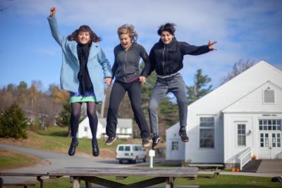 Lucy Johnston ’21, Catherine Canann ’21, and Raven del Missier ’22 were seen miraculously levitating in front of the dining hall last fall, perhaps in response to the work of the Reimagining Marlboro task force. Photo by Emily Weatherill ’21 