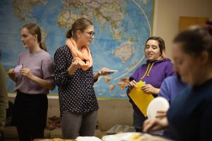 Megan Grove (center), coordinator for campus prevention, intervention, and advocacy, leads students in an evening event dubbed “Consent and Cookies,” part of the sexual wellness education programs on campus. Photo by Emily Weatherill ’21 