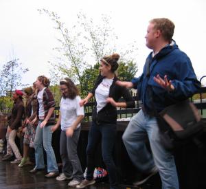 Students encourage community members to dance with them in Brattleboro. Photo by Philip Johansson