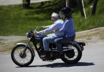 Kit Barry ’68 gives a ride to a mystery motorcycle mama