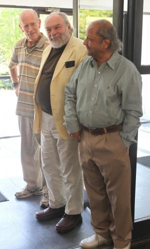 Retired professors Geoffry Brown (theater) and Jaysinh Birjepatil (literature) share a moment with Jerry at reunion 2012. Photo by Adam Keller ’10