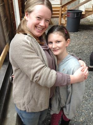 Sophomore Sophie Gorjance hangs out with her “Little” in the greenhouse. Photos by Desha Peacock