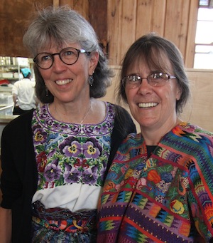 Anthropology professor Carol Hendrickson compares Guatemalan togs with biology professor Jenny Ramstetter ’81 at the retirement party for Carol and economics professor Jim Tober in May. “We are so glad the two of us could share the event,” write Jim and Carol. “Among other things, this meant that we could deflect some of the attention and think that the event really was for the other person.” 