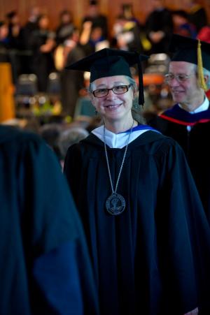 Ellen celebrates commencement in 2012, followed by the first alumni chairman of the board, Dean Nicyper ’76, who was appointed during her tenure. Photo by Jeff Woodward