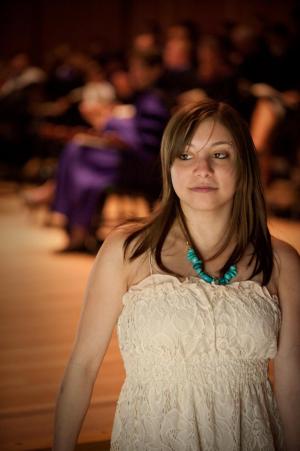 Lucy walks across stage after receiving her Marlboro diploma. Photo by Jeff Woodward