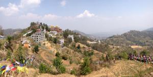 The view from Namo Buddha monastery provides a panorama of Nepal’s rugged foothills, a landscape altered by earthquakes in April. Photo by Blake Stanyon