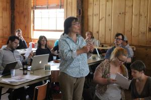 At the final Town Meeting last May, biology professor Jenny Ramstetter and her Forest Ecology class present a proposal for a forest reserve on college land. 