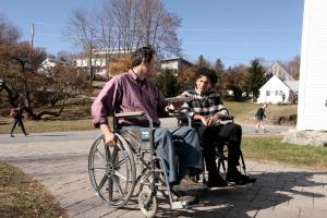 Philosophy professor William Edelglass and sophomore Andrew Domzal adopted wheelchairs for the day during a campus-wide action recognizing the 25th anniversary of the ADA. Photo by Ella McIntosh 