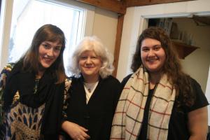 Author Kelly Hickey and Zoe DeHart ’19, both students in the Politics of Change class, chat with Patti Whalen during their public event. 