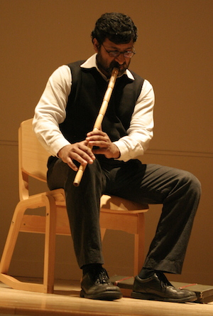 Religion professor Amer Latif plays the ney before a public presentation on Islamic perspectives on addiction, part of the Speech Matters series.