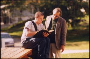 Stan confers with a student.