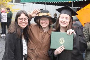 Erin Huang-Shaffer ’18 and former student Allison Power celebrate with Olivia Palermo ’17.  