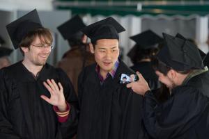 Gordon Morse, Vincent Liu, and Nicolás Cárdenas Tamburini celebrate.