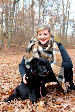 Alexia hangs out with her Newfoundland puppy, Doris. Photo by Elisabeth Joffe ‘14