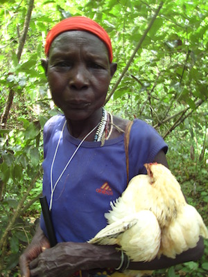 A village volunteer in Ethiopia wears her filter cloth on her head while traveling between villages.