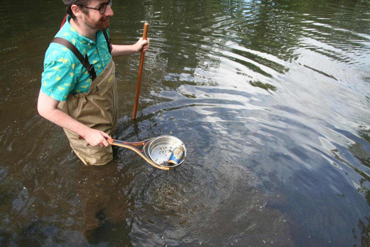 Ryan Stratton ’11, assistant director of admissions, was joined by developer Michael Riley ’09 and COO Becky Catarelli ’04 in an archaeological investigation of the fire pond when it was at its lowest point in July. Among the finds: a folding chair, a full-length mirror, a lighter, and a Dunkin’ Donuts cup.