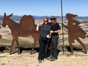 Laura and Dan hike outside Pamplona on the Camino Frances to Santiago de Compostella, Spain.