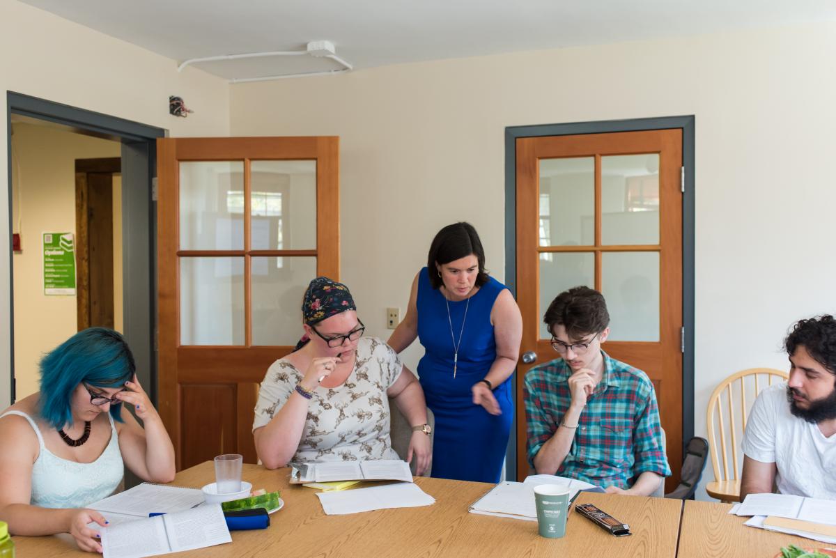 Writing and literature professor Bronwen Tate checks in with her advisees during dedicated hour. Photo by Kelly Fletcher