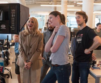 Amber and crew members review takes during filming for a Casper mattress commercial titled “The Sandman has a new gig.” 