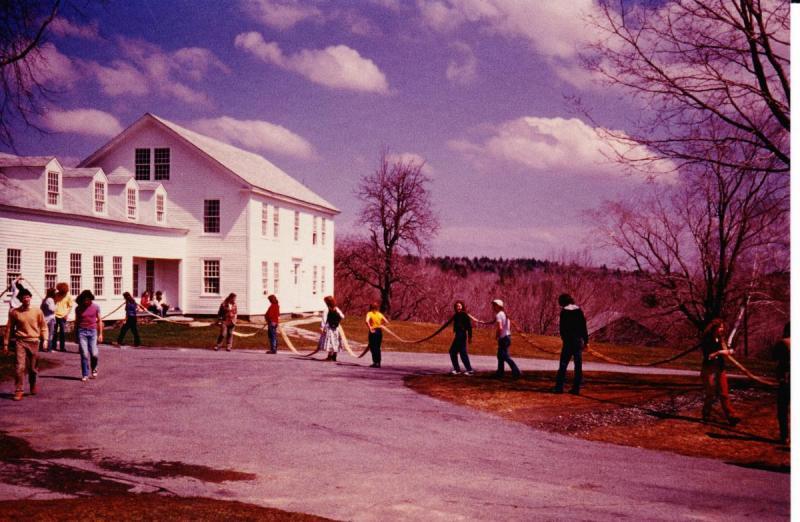 Students stretch out hoses during a fire drill in the 1980s.