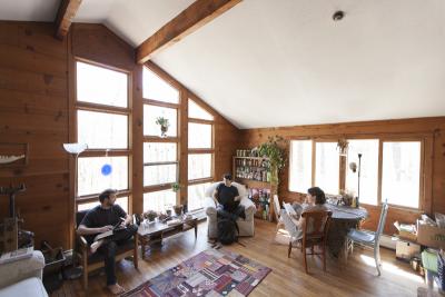 Students enjoy the sunny common room in the farm cottage.